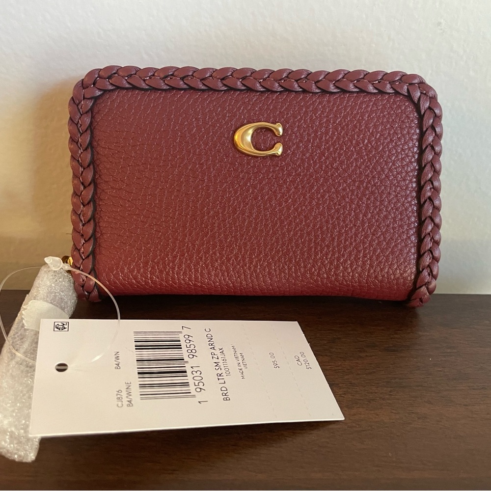 NWT Coach zip around card case with braid.